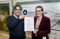 Sylvia McLain receiving the B.T.M. Willis Prize